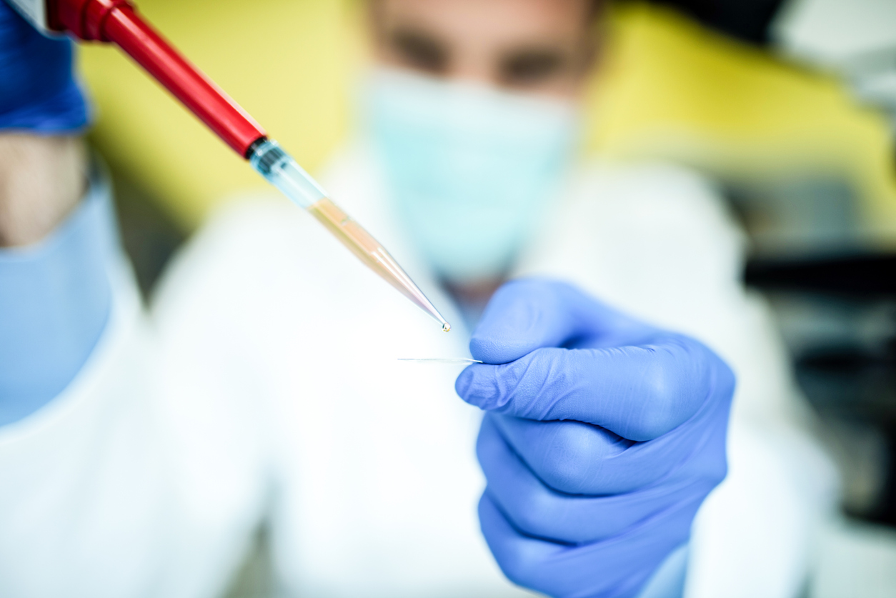 Young Scientist Working With Chemicals in Laboratory.