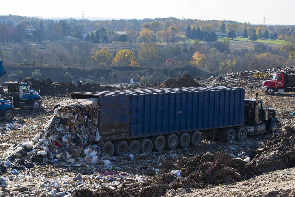garbage truck dumps in Michigan landfill