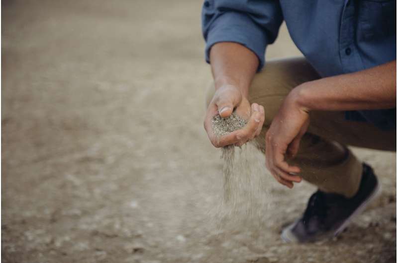 Sand filtering through fingers