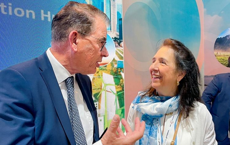 Semida Silveira speaks with Gerd Müller, left, director-general of the UNIDO