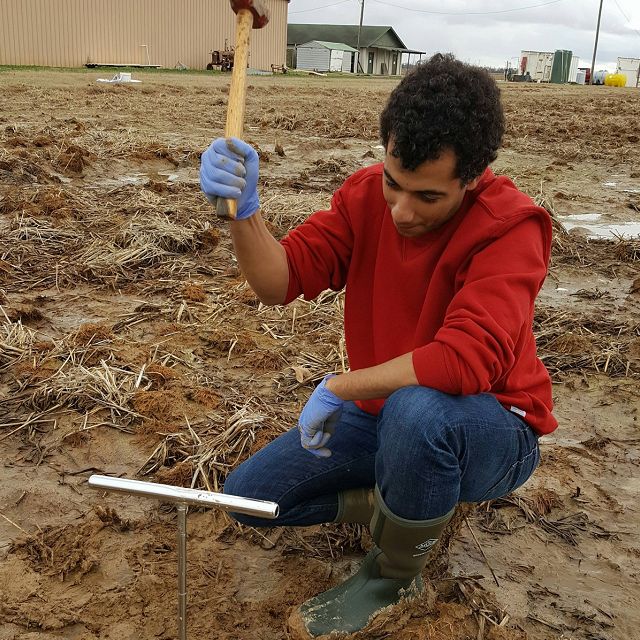 Matthew Reid tests soil
