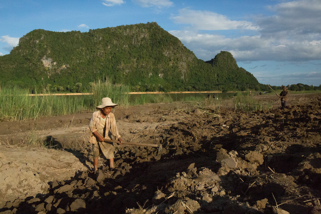 Mekong farmer digging