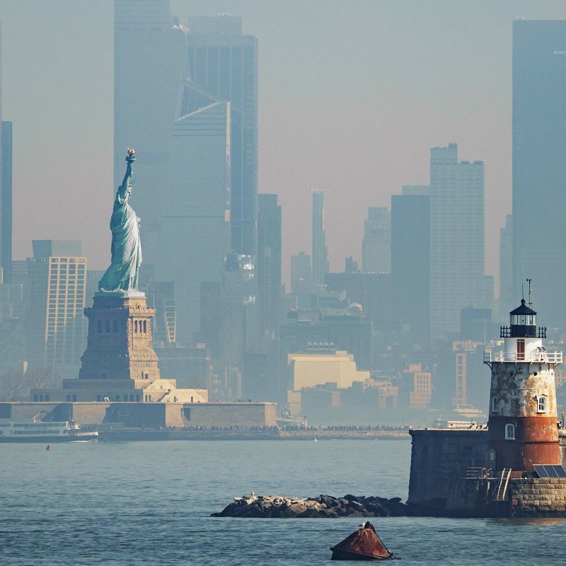 Panorama view of New York city with statue of liberty tomorrow morning at sunrise. View from Staten Island. (iStock)