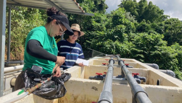 Melitza Crespo-Medina, associate professor at the Interamerican University of Puerto Rico, and Shaojinlin “Kim” Yang, Cornell graduate student in the Richardson Lab, testing water quality at a small community run drinking water system in rural Puerto Rico.